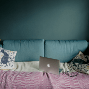 Couch and laptop of someone working from home